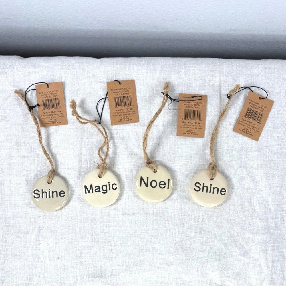 Creative Co-op Ivory Stoneware Tag Ornaments Set of 4 Shine Magic Noel